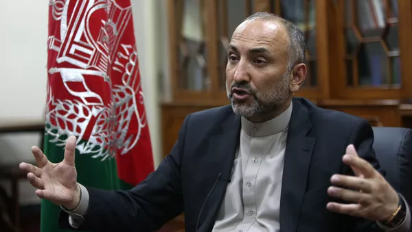 حنیف اتمر با وزیر خارجه ایران در تهران دیدار کرد