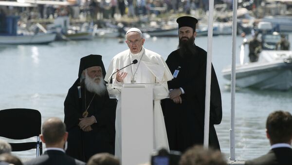 Pope Francis delivers his address at the port of Lesbos during his visits the Greek Island of Lesbos, Greece, April 16, 2016 - اسپوتنیک افغانستان  