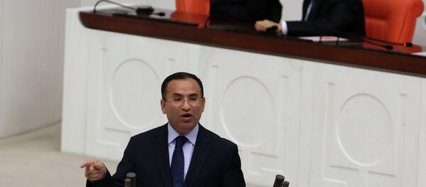 Justice Minister Bekir Bozdag speaks during a special session of the parliament in Ankara, Turkey, Wednesday, March 19, 2014 Justice Minister Bekir Bozdag speaks during a special session of the parliament in Ankara, Turkey, Wednesday, March 19, 2014 - اسپوتنیک افغانستان