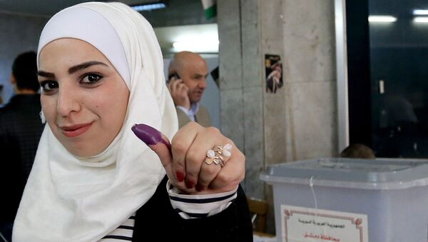 Женщина во время парлментских выборов в Сирии - اسپوتنیک افغانستان  