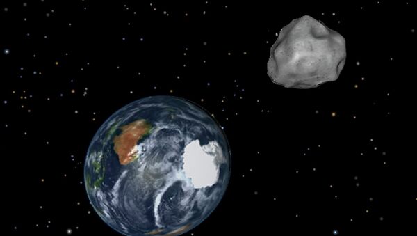 This image provided by NASA/JPL-Caltech shows a simulation of asteroid 2012 DA14 approaching from the south as it passes through the Earth-moon system on Friday, Feb. 15, 2013 - اسپوتنیک افغانستان  