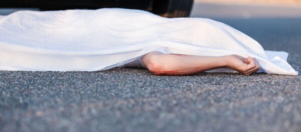 Мертвый человек на асфальте - اسپوتنیک افغانستان  