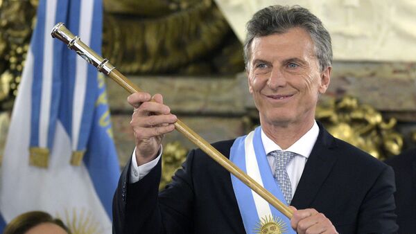Argentine President Mauricio Macri, already wearing the presidential sash and staff, poses during his inauguration at the Casa Rosada government palace in Buenos Aires on December 10, 2015 - اسپوتنیک افغانستان  