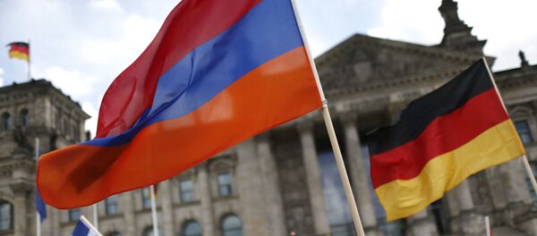 Армянский и немецкий флаги на фоне Рейхстага в Берлине - اسپوتنیک افغانستان  