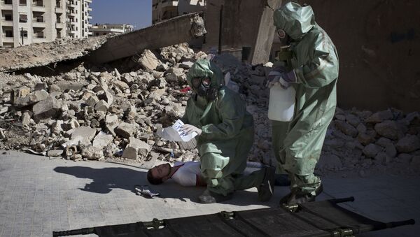 Учебная тренировка по эвакуации пострадавших во время химической атаки в Сирии - اسپوتنیک افغانستان  
