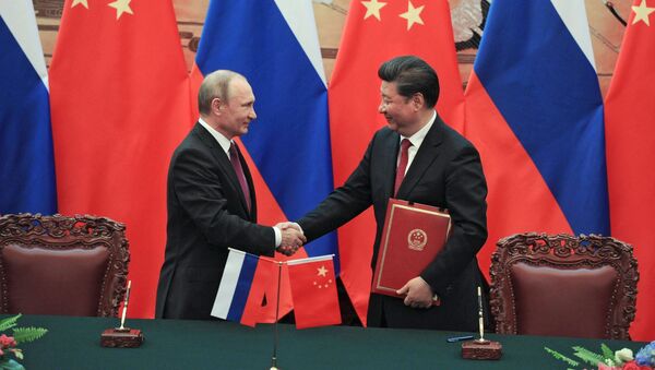 Президент России Владимир Путин и председатель Китайской Народной Республики Си Цзиньпин на церемонии официальной встречи в Пекине - اسپوتنیک افغانستان  