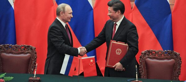 Президент России Владимир Путин и председатель Китайской Народной Республики Си Цзиньпин на церемонии официальной встречи в Пекине - اسپوتنیک افغانستان  