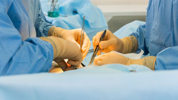 Хирурги во время операции - اسپوتنیک افغانستان  