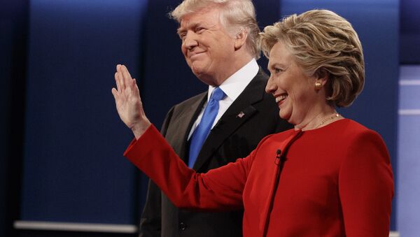 Republican presidential candidate Donald Trump, left, stands with Democratic presidential candidate Hillary Clinton before the first presidential debate at Hofstra University, Monday, Sept. 26, 2016, in Hempstead, N.Y. - اسپوتنیک افغانستان  