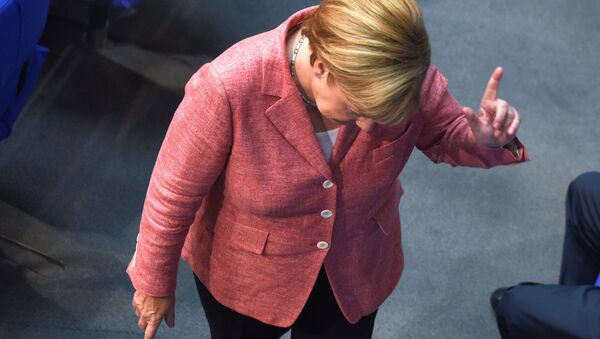 German Chancellor Angela Merkel gestures during a meeting of the lower house of parliament Bundestag on 2017 budget in Berlin, Germany, September 6, 2016. - اسپوتنیک افغانستان  