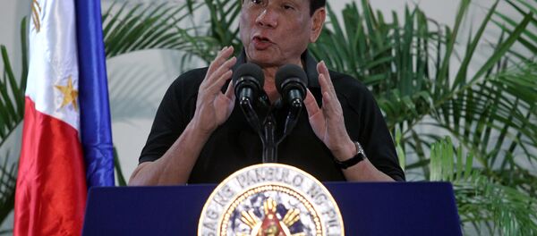 Philippines President Rodrigo Duterte gestures during a news conference upon his arrival from a state visit in Vietnam at the International Airport in Davao city, Philippines September 30, 2016. Philippines President Rodrigo Duterte gestures during a news conference upon his arrival from a state visit in Vietnam at the International Airport in Davao city, Philippines September 30, 2016. - اسپوتنیک افغانستان