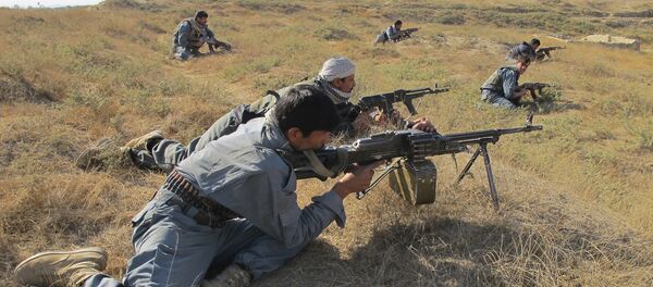 Afghan National Army soldiers take positions during a joint operation by ISAF and ANSF against taliban in Kunduz province, north of Kabul, Afghanistan (File) - اسپوتنیک افغانستان  