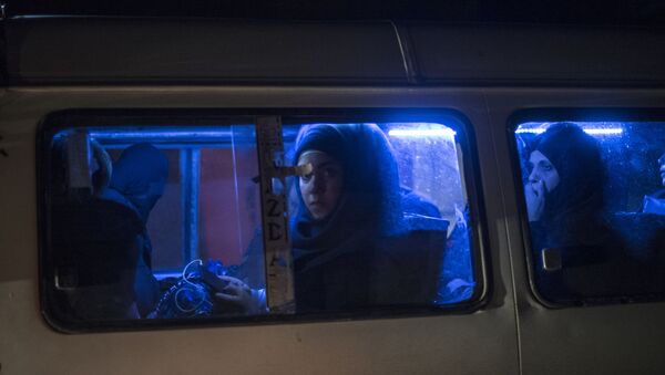Женщина в одном из автобусов Дамаска - اسپوتنیک افغانستان  