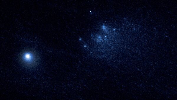 Фотография кометы 332P/Икея-Мураками, распавшейся на части прямо на глазах ученых - اسپوتنیک افغانستان  