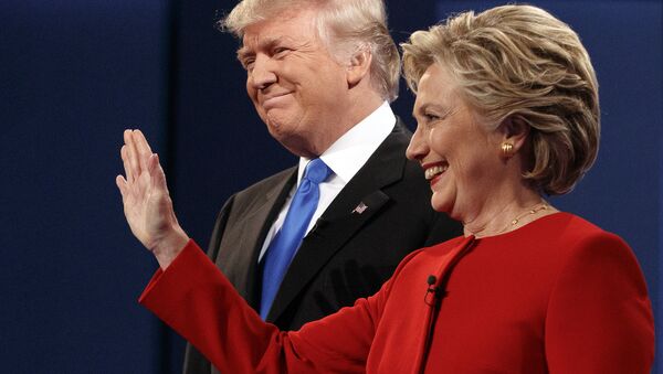 Republican presidential candidate Donald Trump, left, stands with Democratic presidential candidate Hillary Clinton at the first presidential debate at Hofstra University, Monday, Sept. 26, 2016, in Hempstead, N.Y. - اسپوتنیک افغانستان  