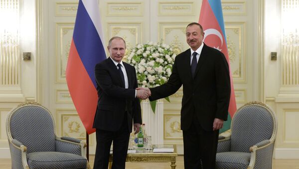 Президент России Владимир Путин и президент Азербайджана Ильхам Алиев во время встречи в Баку - اسپوتنیک افغانستان  