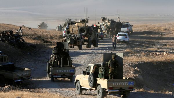 Peshmerga forces advance in the east of Mosul to attack Islamic State militants in Mosul, Iraq, October 17, 2016 - اسپوتنیک افغانستان  