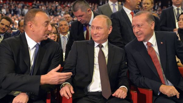 Президент Азербайджана Ильхам Алиев, президент России Владимир Путин и президент Турции Реджеп Тайип Эрдоган на 23-м Мировом энергетическом конгрессе в Стамбуле - اسپوتنیک افغانستان  