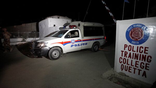 A police truck is seen at a gate to the Police Training Center after an attack on the center in Quetta, Pakistan October 25, 2016 - اسپوتنیک افغانستان  