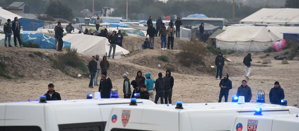 مهاجران اخراج شده از کاله سه ناحیه پاریس را تصرف کردند - اسپوتنیک افغانستان  