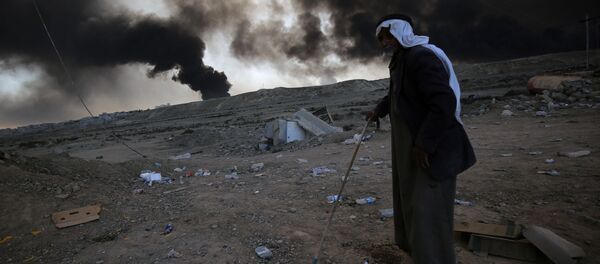 کشف اجساد 112 نفر در یکی از مناطق بمباران شده در شهر موصل کشف اجساد 112 نفر در یکی از مناطق بمباران شده در شهر موصل - اسپوتنیک افغانستان