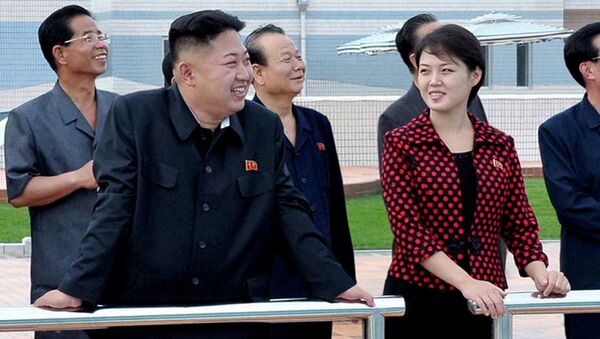 North Korean leader Kim Jong Un, front left, accompanied by his wife Ri Sol Ju, front right, inspects the Rungna People's Pleasure Ground in Pyongyang - اسپوتنیک افغانستان  